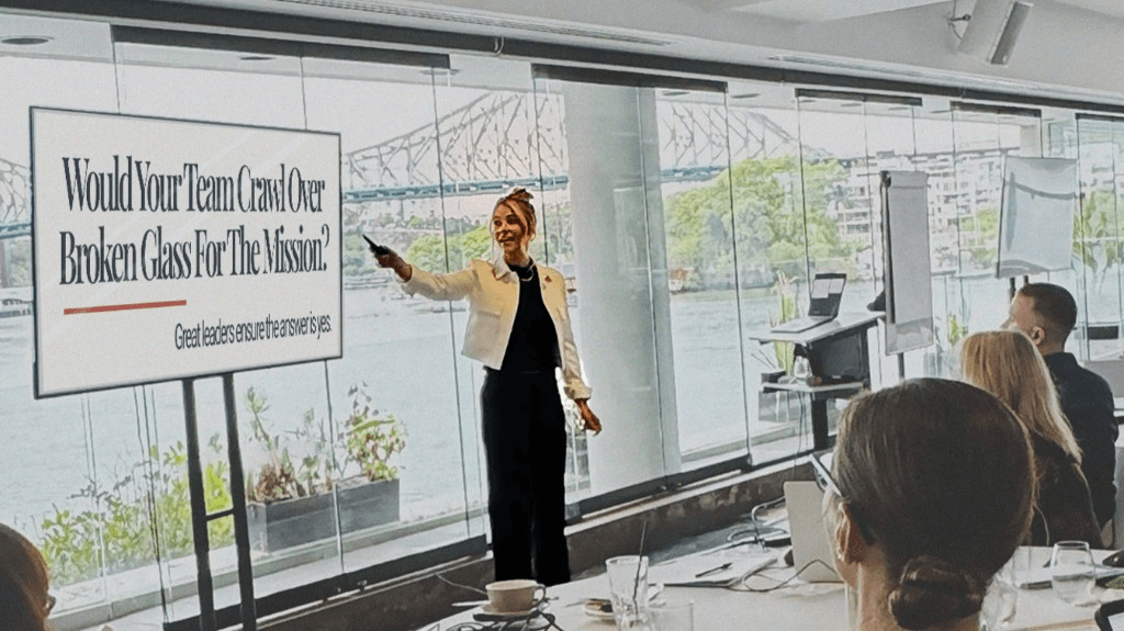 Corinne presenting to a room