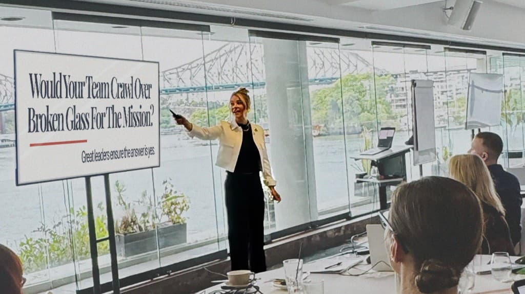 Corinne presenting to a room